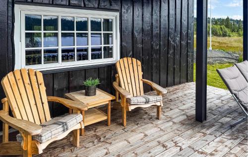 two chairs and a table on a patio at 2 Bedroom Lovely Home In Nesbyen in Nesbyen