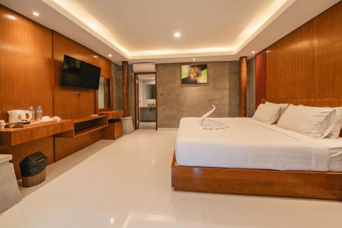 Uma Mani Villa Jimbaranにあるベッド