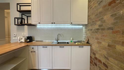 Dapur atau dapur kecil di Carol Residence - ultra central - powered by NEO