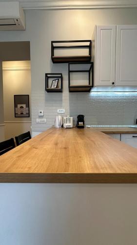 Dapur atau dapur kecil di Carol Residence - ultra central - powered by NEO