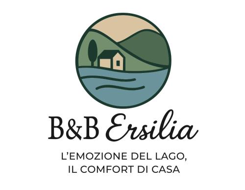 a shield with a house in the water and the words bc iguana island la at B&B Ersilia in Eupilio