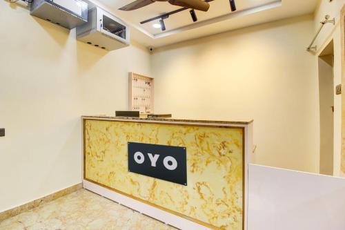 an office with aype sign on a wall at Super Hotel O EMBASSYINN in Kondapur