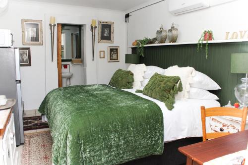 Ένα ή περισσότερα κρεβάτια σε δωμάτιο στο Guesthouse TiinTiin