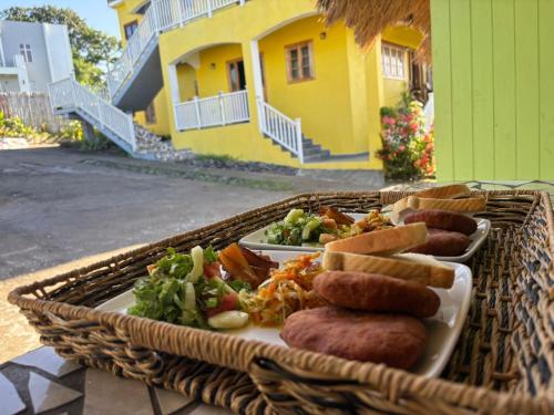 a basket filled with different types of food on a table at Desired View vacation rentals in LʼIvrogne