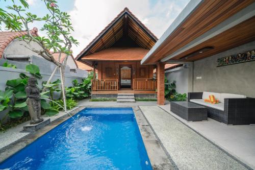 Uma Mani Villa Jimbaranの敷地内または近くにあるプール