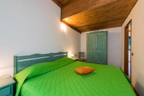 Postel nebo postele na pokoji v ubytování Camping Village Il Poggetto