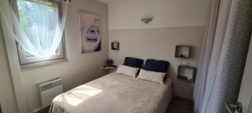 Katil atau katil-katil dalam bilik di Apartment l'Esplanade - Vielle Aure