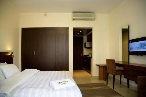 Katil atau katil-katil dalam bilik di Santona Residence