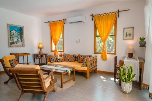 Matemwe Villa 2 tesisinde bir oturma alanı