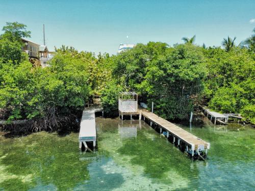 a dock in the middle of a body of water at Kokomo Hotel in Culebra