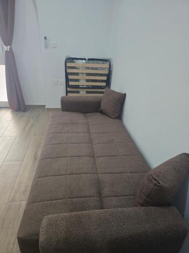 Ένα ή περισσότερα κρεβάτια σε δωμάτιο στο Studio Groundfloor Apartment