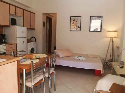 Postel nebo postele na pokoji v ubytování Olga's House