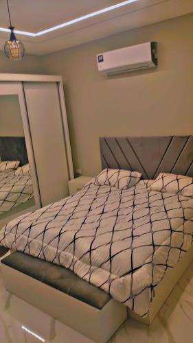 Ένα ή περισσότερα κρεβάτια σε δωμάτιο στο Jodream chalet Al-nadi chalet