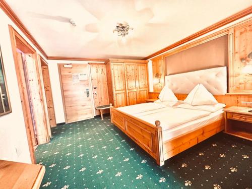 Postel nebo postele na pokoji v ubytování Hotel Das Urbisgut