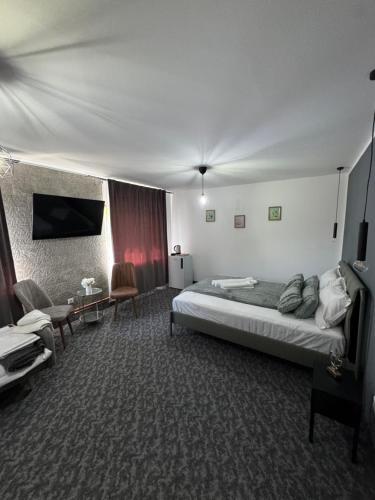 Postel nebo postele na pokoji v ubytování Casa Logascu