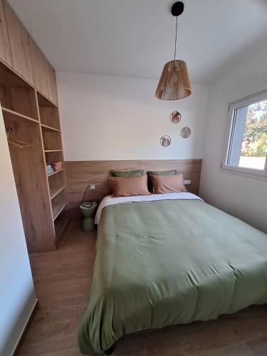 Postel nebo postele na pokoji v ubytování Gîte les Bret'Zen