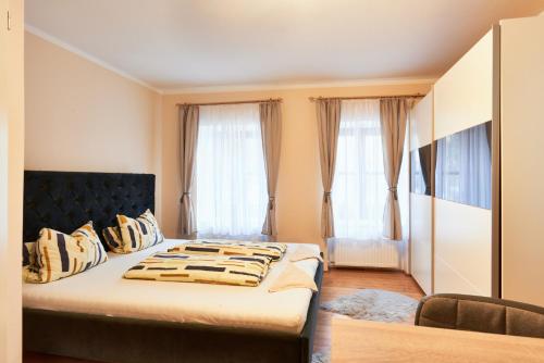 Postel nebo postele na pokoji v ubytování Silent Apartments near Vienna