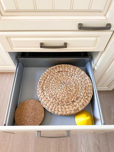 a drawer with some food items in a kitchen at Ferienwohnung Seehund in Wilhelmshaven