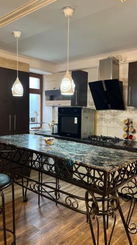 Adis Home tesisinde mutfak veya mini mutfak