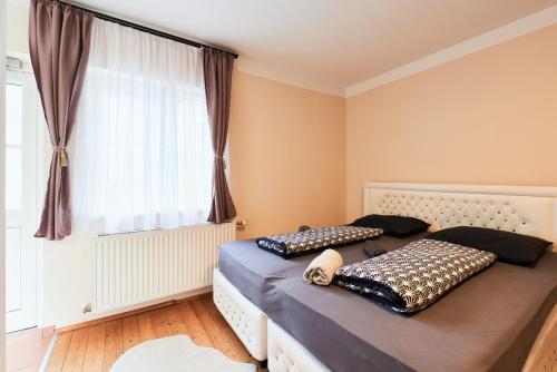 Postel nebo postele na pokoji v ubytování Silent Apartments near Vienna