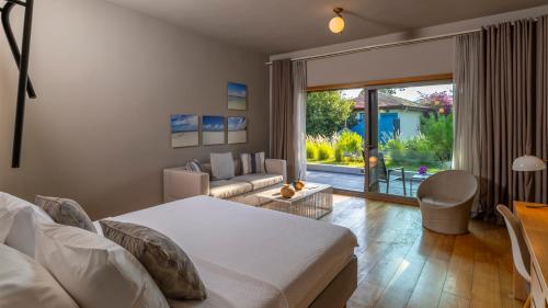 Ένα ή περισσότερα κρεβάτια σε δωμάτιο στο Miamai Boutique Hotel - Adult Only
