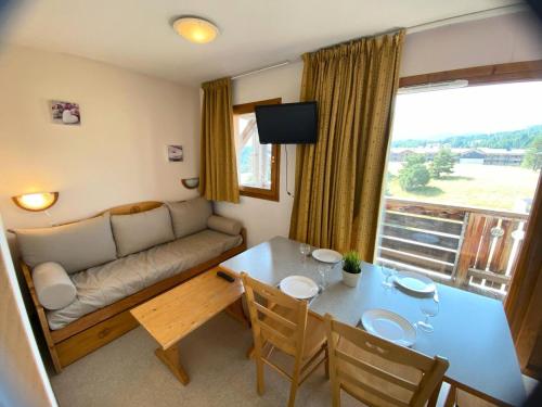 Posezení v ubytování Les Chalets De Superd Chardon Bleu - APPARTEMENT 4 PERSONNES AGREABLE EXPO SUD MAE-8764