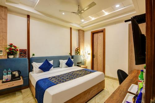 Ένα ή περισσότερα κρεβάτια σε δωμάτιο στο Hotel Mehul International -Near New Delhi Railway Station, Paharganj & Connaught Place