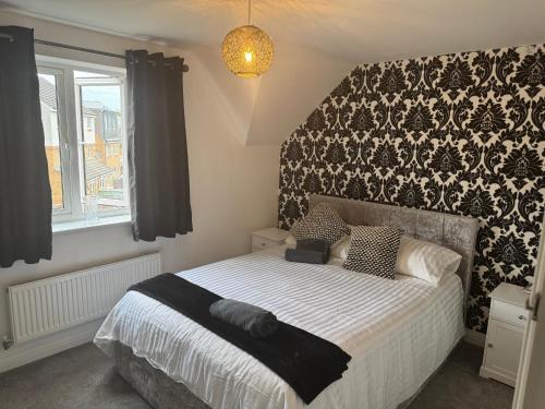 Postel nebo postele na pokoji v ubytování Executive Stays Uxbridge