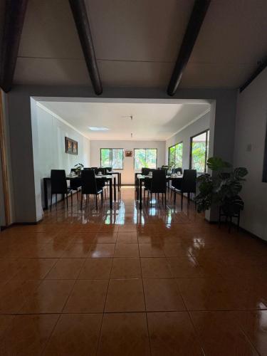 a dining room with a table and chairs at Pumakari Rapa Nui in Hanga Roa