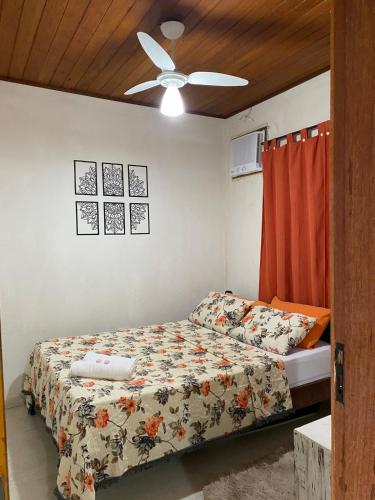 Katil atau katil-katil dalam bilik di Apartamento 2 quartos Vila do Abraão