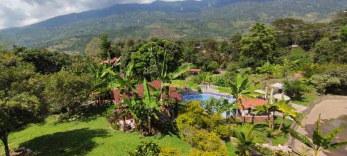 an aerial view of a resort with a swimming pool at Cabaña Orquidea Campestre in Fusagasuga