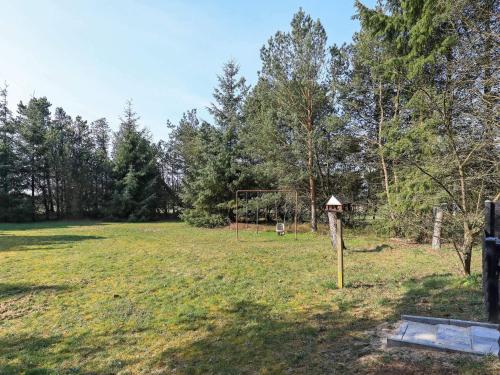 a field with a goal in the middle of it at 4 person holiday home in Oksbøl-By Traum in Oksbøl