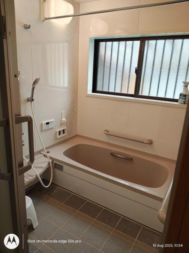 Un baño de Smith 夫婦