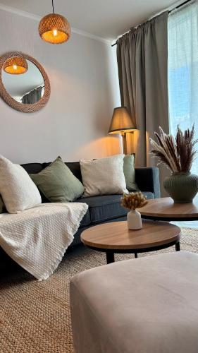 a living room with a couch and a table at Duna & Mar I Concon in Concón