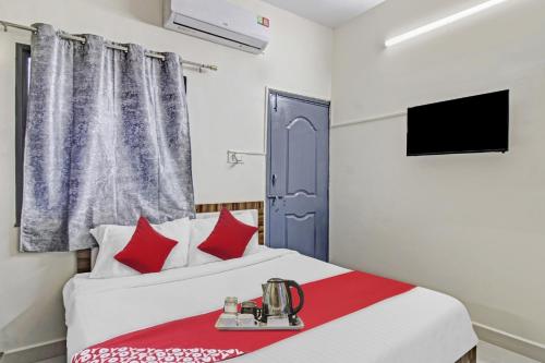 Katil atau katil-katil dalam bilik di Hotel O Pritesh Grand