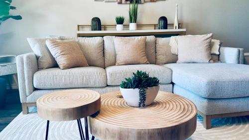 a living room with a couch and a table at Self Chk-In 10mins to Ft Cavazos in Killeen