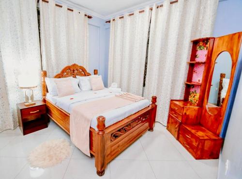 Ένα ή περισσότερα κρεβάτια σε δωμάτιο στο Abnaa Apartment