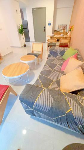 a room with a row of pillows on the floor at Agile TRX Luxury Condo in Bukit Bintang in Kuala Lumpur