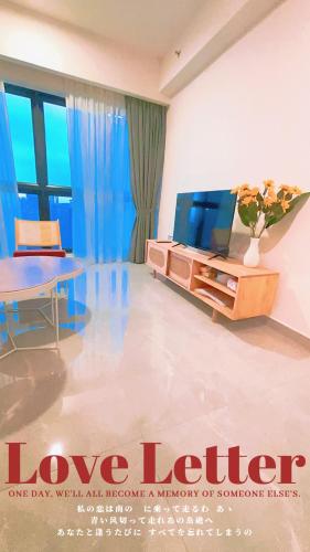 a movie poster of a living room with a television at Agile TRX Luxury Condo in Bukit Bintang in Kuala Lumpur
