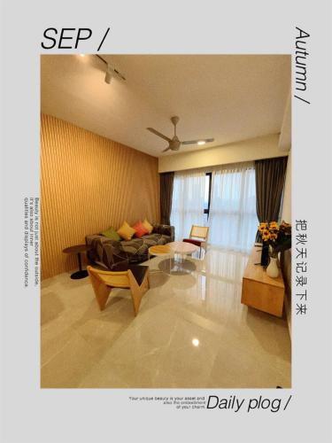 a living room with a couch and a table at Agile TRX Luxury Condo in Bukit Bintang in Kuala Lumpur