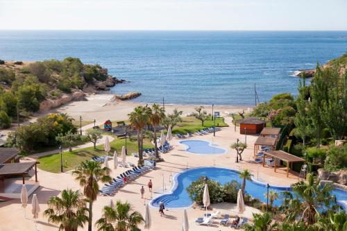 an aerial view of a resort with a beach at RVHotels Ametlla Mar in L'Ametlla de Mar
