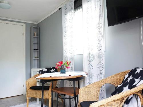 a dining room with a table and chairs at 2 person holiday home in STRÖMSTAD-By Traum in Strömstad