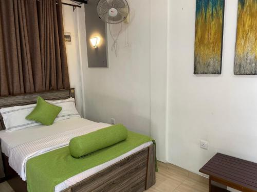 Una cama o camas en una habitación de Ella Always Welcome Resort