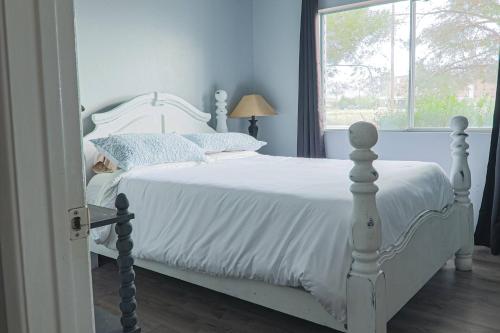 Una cama o camas en una habitación de The Padeo