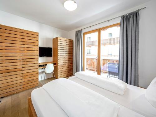 Ένα ή περισσότερα κρεβάτια σε δωμάτιο στο Apartment in Gerlos near Ski Lift