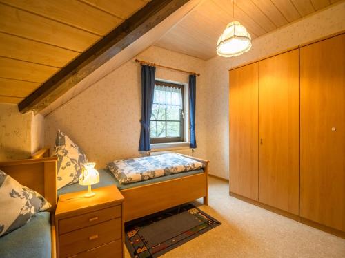 Katil atau katil-katil dalam bilik di Eschfeld Sauna Apartment