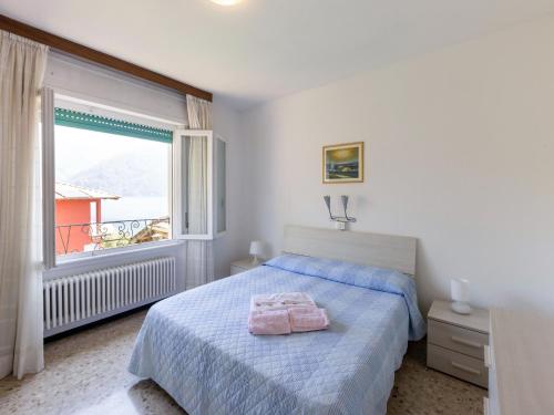 Ένα ή περισσότερα κρεβάτια σε δωμάτιο στο Holiday Home Acquaseria by Lake Como