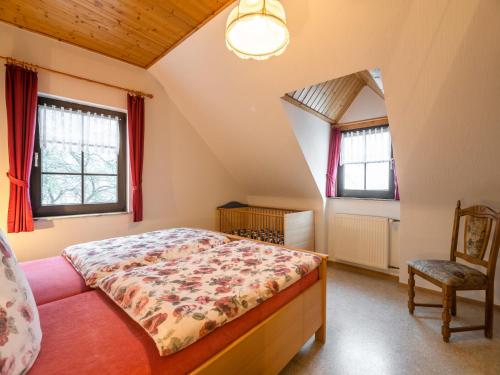 Katil atau katil-katil dalam bilik di Eschfeld Sauna Apartment