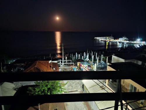a view of a body of water at night at SeaView Studios in Potos