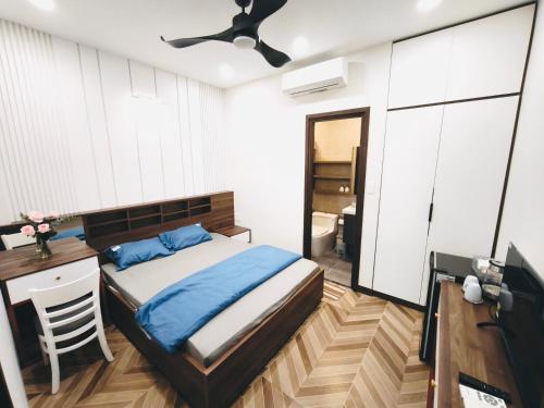 En eller flere senge i et værelse på Kim's studio